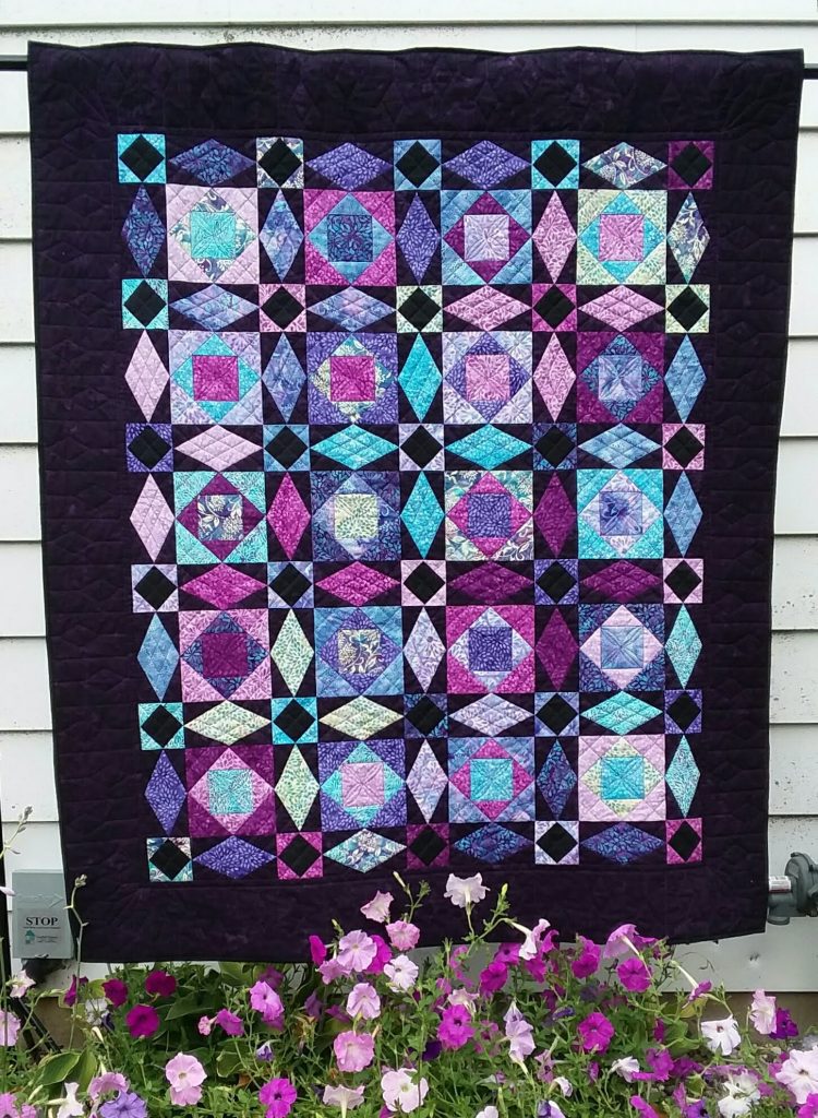 This image has an empty alt attribute; its file name is Passion-Petals-Connie-Kauffman-750x1024.jpeg